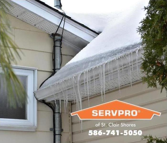 ice forming on rain gutter 