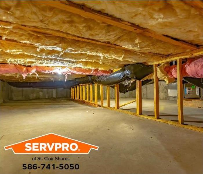 A crawl space and pipes are insulated to prevent frozen pipes.