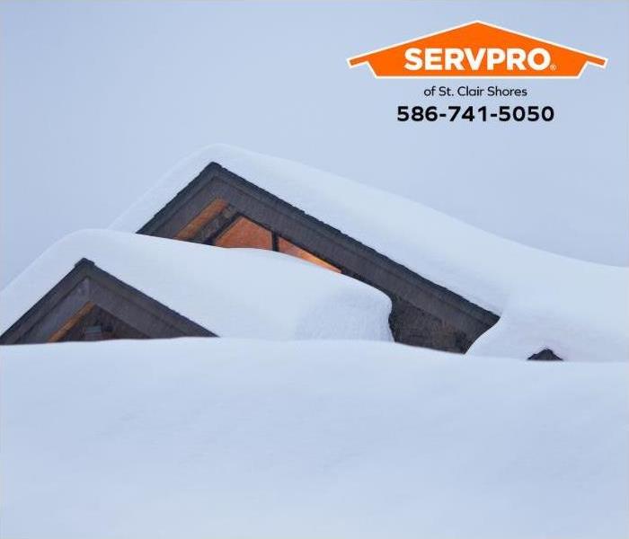 A roof with a heavy load of snow is shown.